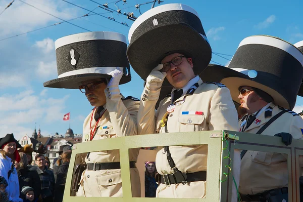 People take part in the parade at Lucerne carnival in Lucerne, Switzerland. — ストック写真