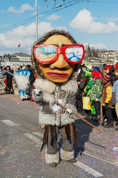 Person takes part in the parade at Lucerne carnival in Lucerne, Switzerland. — ストック写真