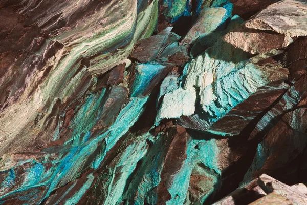 Textura abstrata do cobre oxidado nas paredes da mina de cobre subterrânea em Roros, Noruega . Fotografia De Stock