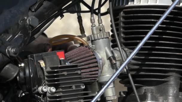 Hands Repairing the Engine of a Motorcycle. — Stock Video