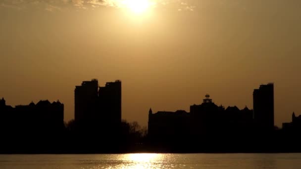 City at Beautiful Sunset Near River. — Stock Video