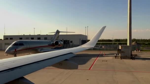 The airplane prepares for takeoff passing another plane. — Stock Video