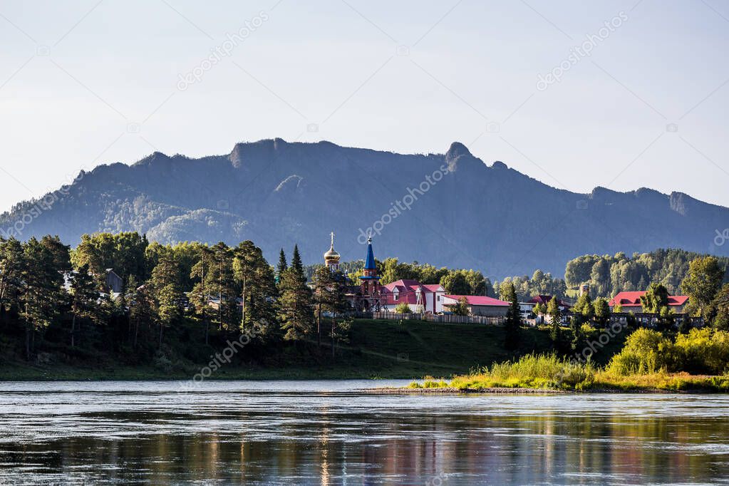 Turochak village, Altai Republic, Russia-August 20, 2020: View of the Biya river, Turochak village and Salop mountain