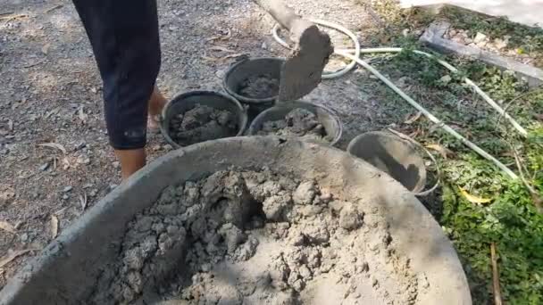 Construction Workers Pouring Cement Buckets Work — Stock Video