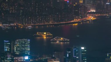 Fei ngo shan Kowloon Peak gece timelapse Hong Kong cityscape silueti.