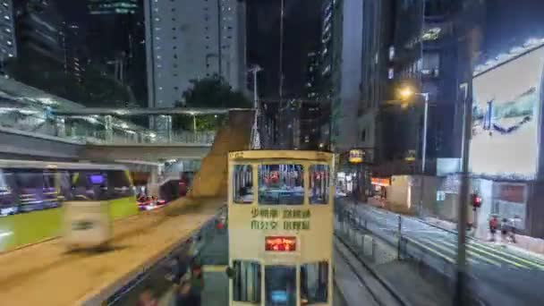View from double-decker tram on street of HK timelapse hyperlapse. — Stock Video