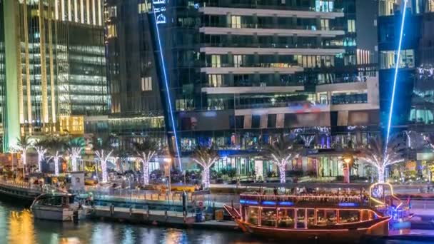 View of Dubai Marina Towers and canal in Dubai night timelapse — Stock Video