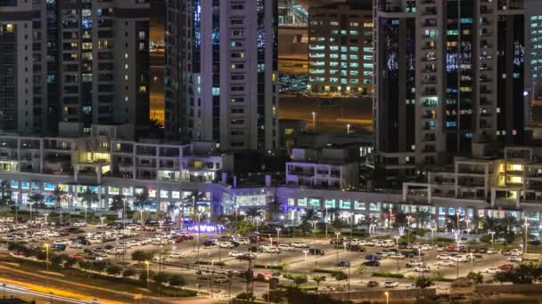 Vista aérea panorámica de una gran ciudad moderna por la noche timelapse. Business bay, Dubai, Emiratos Árabes Unidos . — Vídeo de stock