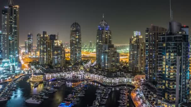 Beautiful aerial top view at night timelapse of Dubai Marina in Dubai, UAE — Stock Video