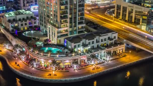 Nádherný letecký pohled shora na noční timelapse Dubai Marina v Dubaji, Spojené arabské emiráty — Stock video