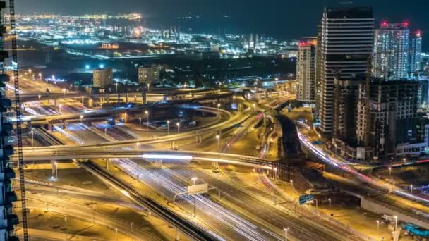 Hermosa vista aérea superior por la noche timelapse de Dubai Marina en Dubai, Emiratos Árabes Unidos — Vídeo de stock