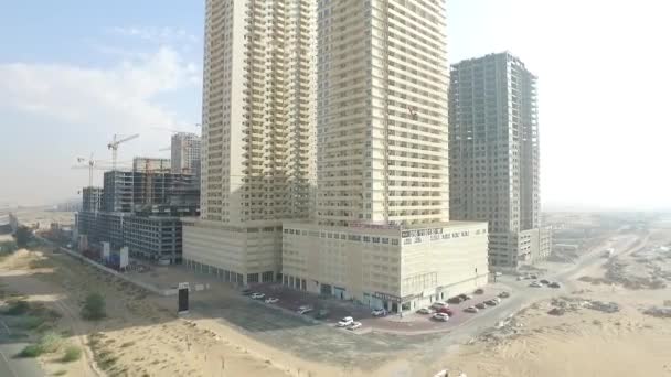 Stadsgezicht van Ajman met moderne gebouwen luchtfoto bovenaanzicht — Stockvideo