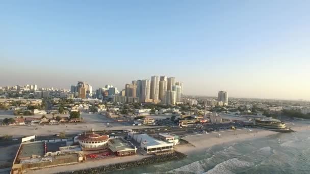 Stadsbilden i Ajman med moderna byggnader topp Flygfoto — Stockvideo