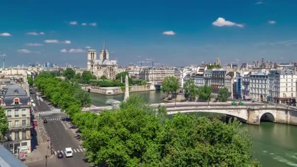 Paris Panorama with Cite Island and Cathedral Notre Dame de Paris timelapse from the Arab World Institute observation deck Франція. — стокове відео