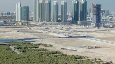 Abu Dabi 'deki Al Reem Adası' ndaki binalar yukarıdan zaman ayarlı..