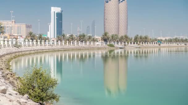 View of skyscrapers skyline with Al Bahr towers in Abu Dhabi timelapse. United Arab Emirates — Stock Video