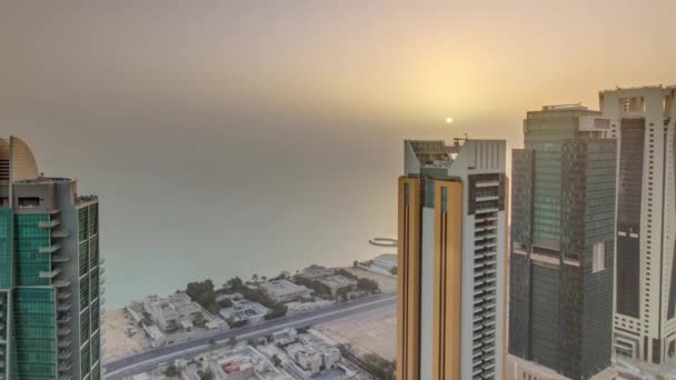 The skyline of West Bay and Doha City Center during sunrise timelapse, Qatar — Stock Video