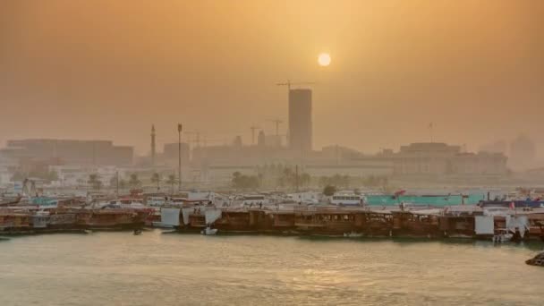 Sunset at Doha Bay timelapse with Traditional Wooden Dhow Fishing Boats. — Stock Video