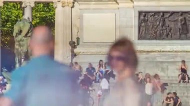 Tourists on boats at Monument to Alfonso XII timelapse in the Park of the Pleasant Retreat in Madrid, Spain