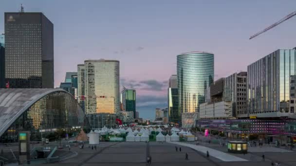 The stunning Defence Parisian business district bristling with skyscrapers day to night timelapse. — Stock Video