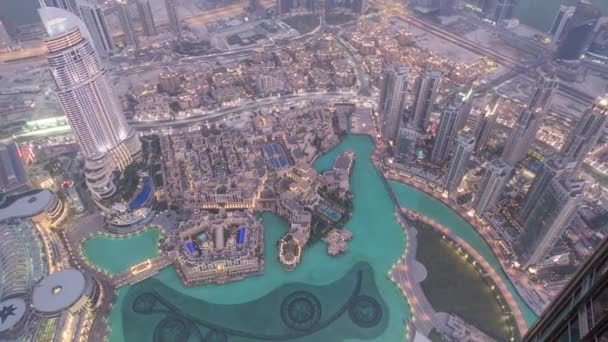 Transizione dal centro di Dubai giorno alla notte con luci della città da sopra timelapse — Video Stock