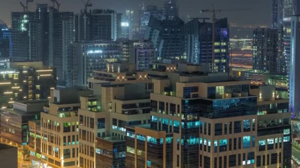 Bay Square district night timelapse with mixed use and low rise complex office buildings located in Business Bay in Dubai — Stock Video