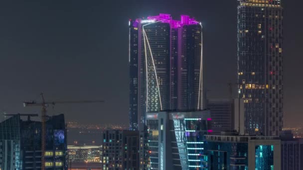 Skyscrapers at the Business Bay air night timelapse in Dubai, United Arab Emirates — стокове відео