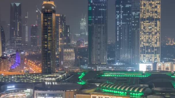 Vista aérea do Dubai Centro Financeiro Internacional DIFC distrito noite timelapse — Vídeo de Stock