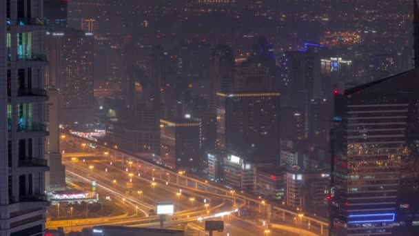 Widok z lotu ptaka w Dubaju pokazujący wysokość al barsha i zieleń obszar dzielnicy noc timelapse — Wideo stockowe