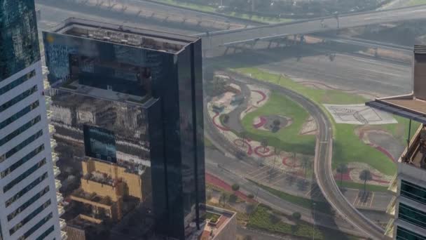 Big crossroad junction between JLT district and Dubai Marina intersected by Sheikh Zayed Road aerial timelapse. — Stock Video