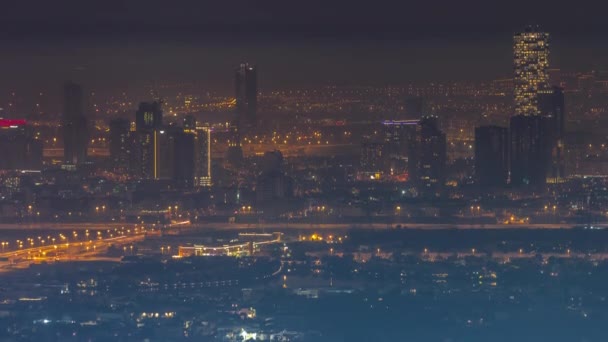 Vista aérea de Jumeirah Village Circle bairro noite timelapse — Vídeo de Stock