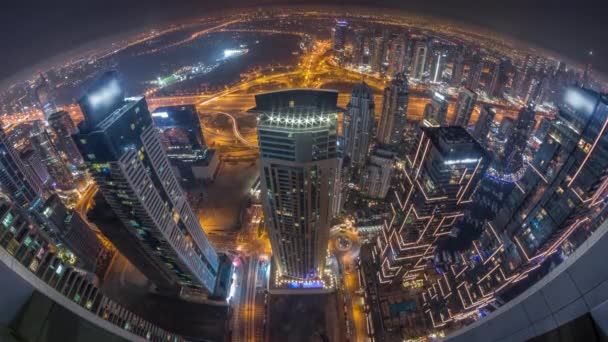 Panorama di Dubai Marina con grattacieli JLT e campo da golf notte a giorno timelapse, Dubai, Emirati Arabi Uniti. — Video Stock