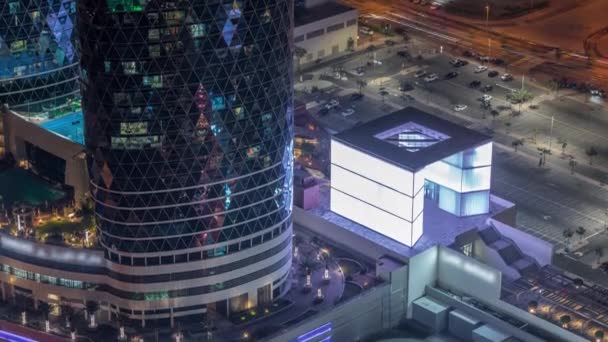 Puerta Avenida nuevo paseo aéreo noche timelapse, ubicado en Dubai centro financiero internacional. — Vídeos de Stock