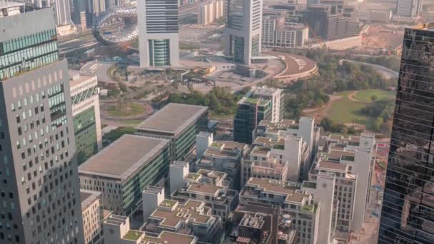 Hotels and office buildings in financial district in Dubai aerial timelapse — Stock Video
