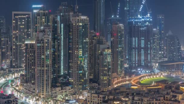 Futurist aerial all night cityscape timelapse with illuminated architecture of Dubai downtown, Émirats arabes unis. — Video