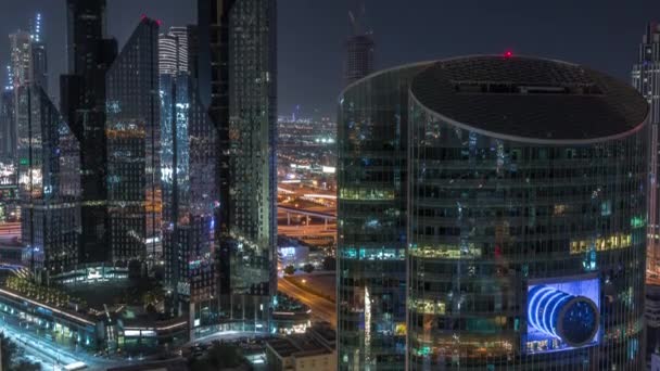 Dubai International Financial Center drapacze chmur anteny całą noc timelapse. — Wideo stockowe