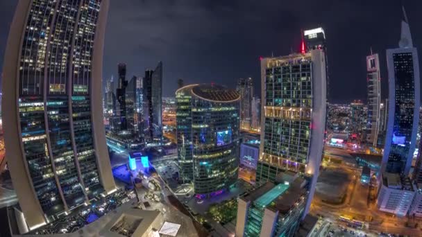 Dubai internationella finansiella centrum skyskrapor antenn natt timelapse. — Stockvideo