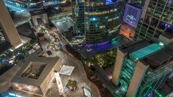 Dubaj mezinárodní finanční centrum mrakodrapy antény celou noc timelapse. — Stock video