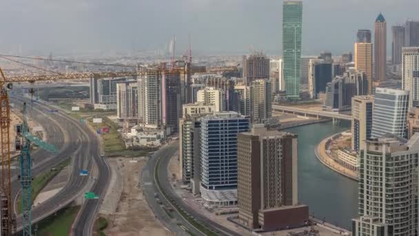 Skyline met moderne architectuur van Dubai business bay torens timelapse. Luchtzicht — Stockvideo