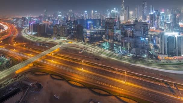 Panoramatický panorama Dubaje s obchodní zátoce a centra čtvrti po celou noc timelapse. — Stock video