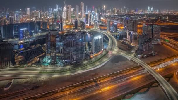 Skyline panoramico di Dubai con business bay e timelapse notte quartiere centro. — Video Stock