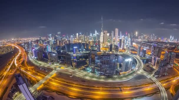 Skyline panorâmico de Dubai com baía de negócios e centro da cidade noite timelapse distrito. — Vídeo de Stock