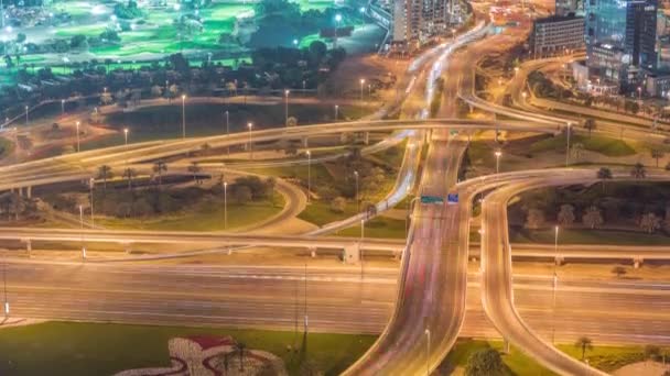 Huge highway crossroad junction between JLT district and Dubai Marina night timelapse. — Stock Video