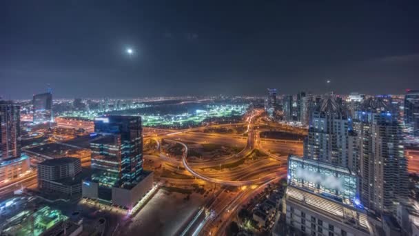 Huge highway crossroad junction between JLT district and Dubai Marina night timelapse. — Stock Video