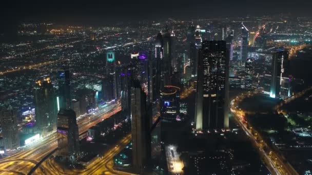 Dubai centro por la noche con luces de la ciudad de Burj Khalifa timelapse — Vídeos de Stock