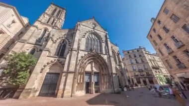Eglise Saint-Pierre Church of St. Peter timelapse hyperlapse. A Medieval church situated in the heart of Old Bordeaux at Place Saint-Pierre. Front view with entrance. France