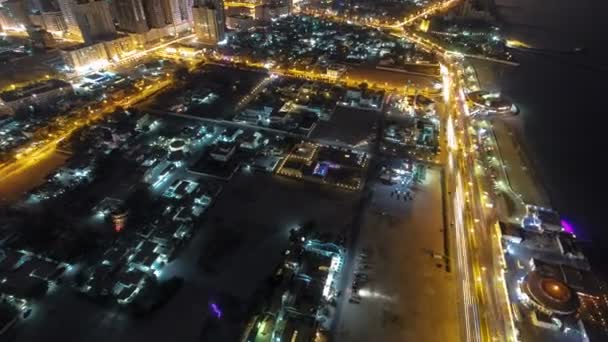 Városképet gazdagító épületnek szánták, Ajman tetőtéri a timelapse éjszaka. Ajman, Ajman, Egyesült Arab Emírségek Emirátus fővárosa. — Stock videók