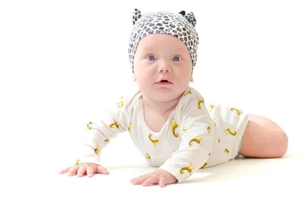 Niño bebé en pijama sorprendido aislado en blanco —  Fotos de Stock