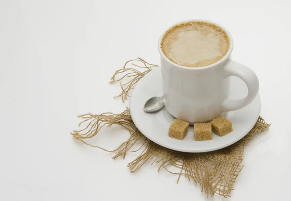 Cappucino with dark sugar — Stock Photo, Image