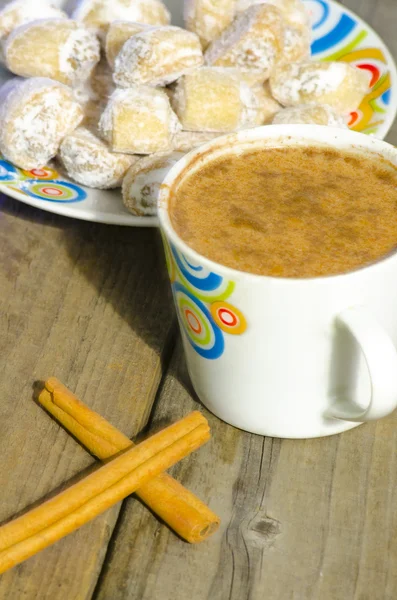 Hot chocolate with crescent rolls stuffed with walnut on wood — Stock Photo, Image